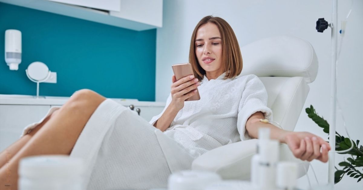 A woman enjoying the fall season, feeling better after receiving IV Therapy for Seasonal Allergies.