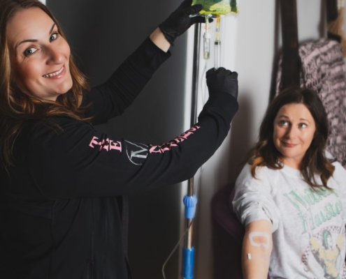 A patient receives IV Therapy from a nurse at The IV Nurses.